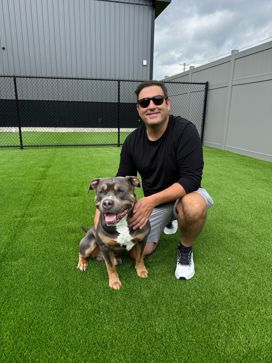 Founder Chad Kaiser with Bentley on the real Barkingham Palace turf yard in Rotterdam, NY