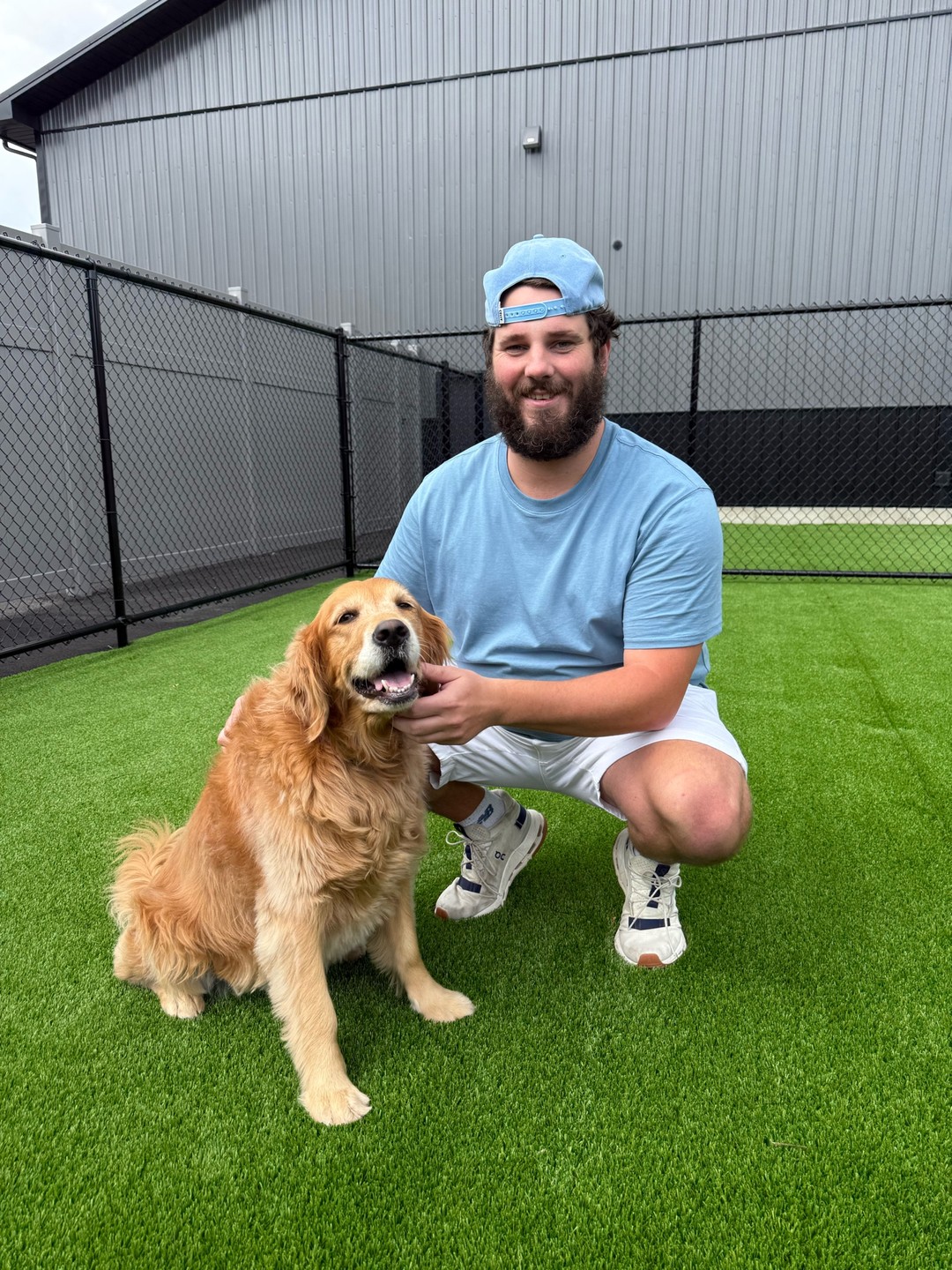 Founder Jack Carney with Callie on the real Barkingham Palace turf yard in Rotterdam, NY